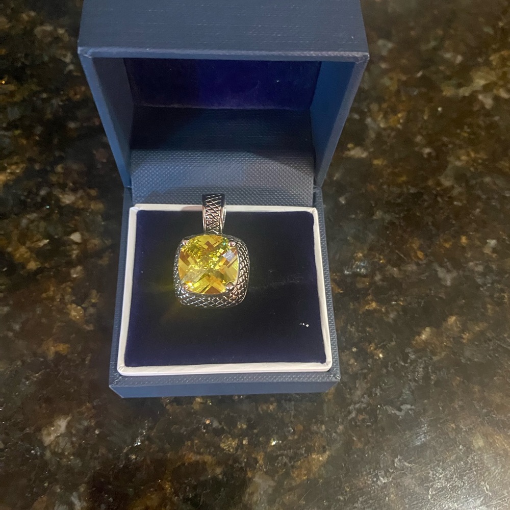 Elegant Silver and Yellow Gemstone Pendant